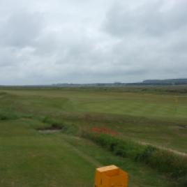 The view from the 1st tee, looking slightly out to the right to reveal the entire 18th green and double fairway shared by the opening and closing holes.