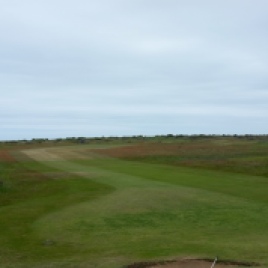 The view from the right-hand side of the green on the 12th hole looking back down the length of the fairway.
