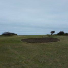 The view from the 13th fairway, from just in front of the first bunker. This image gives a good indication of the sharp rise in elevation over the last third of this hole.