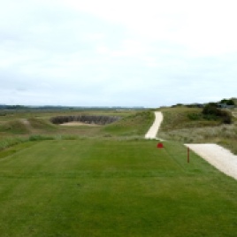 The view from the 15th tee. The huge cross bunker short of the green is the deepest on the course.